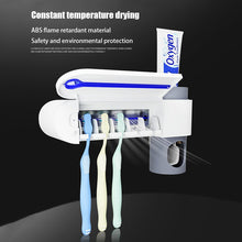 Load image into Gallery viewer, Antibacteria UV Light Ultraviolet Toothbrush Sterilizer Automatic Toothpaste Dispenser Toothbrush Holder Cleaner
